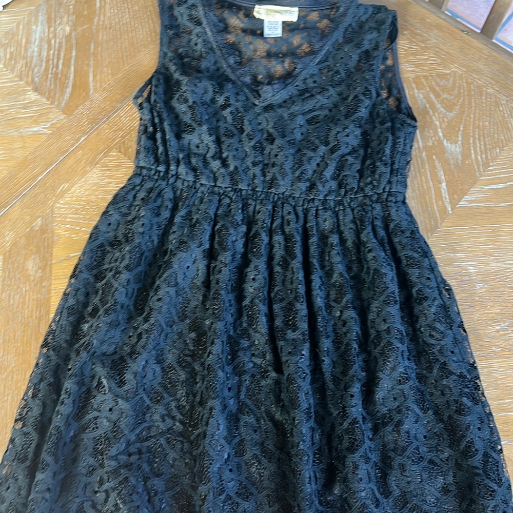 2 cute dresses size medium both together